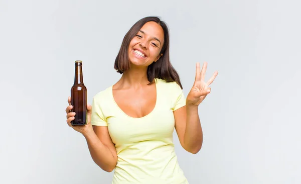 Young Hispanic Woman Smiling Looking Friendly Showing Number One First — Stock Photo, Image