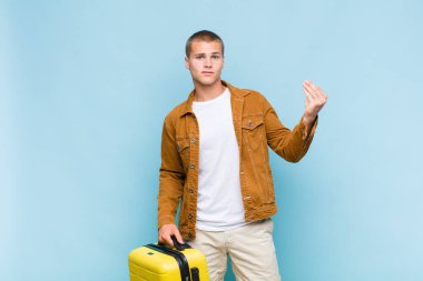 Genç sarışın adam kapiş ya da para hareketi yapıyor, sana borçlarını ödemeni söylüyor.!