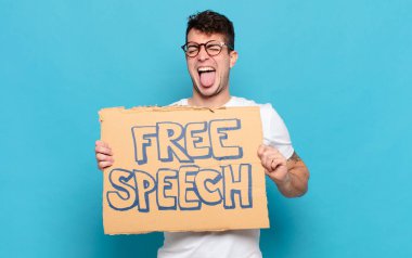 Neşeli, kaygısız, asi tavırlı, şakacı ve dilsiz genç adam, eğleniyor.