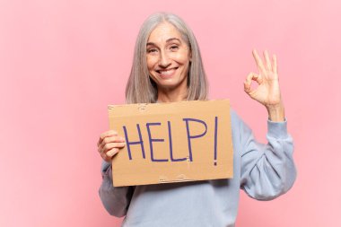 'İmdat!' diyen orta yaşlı bir kadın! kelime