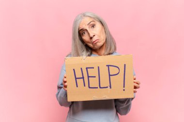 'İmdat!' diyen orta yaşlı bir kadın! kelime