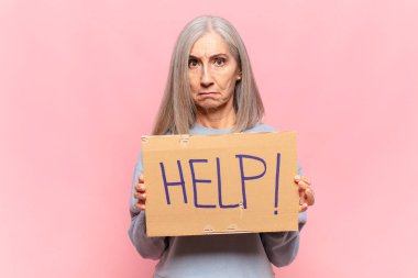 'İmdat!' diyen orta yaşlı bir kadın! kelime