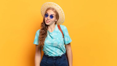 feeling puzzled and confused, with a dumb, stunned expression looking at something unexpected