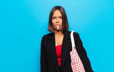 young pretty woman with a hearts bag