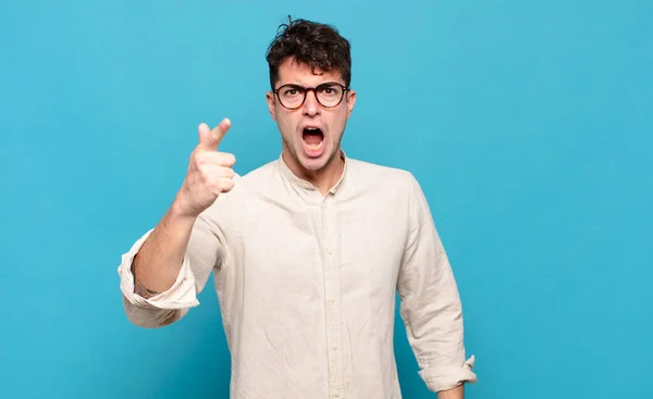 Young Man Pointing Camera Angry Aggressive Expression Looking Furious Crazy — Stock Photo, Image