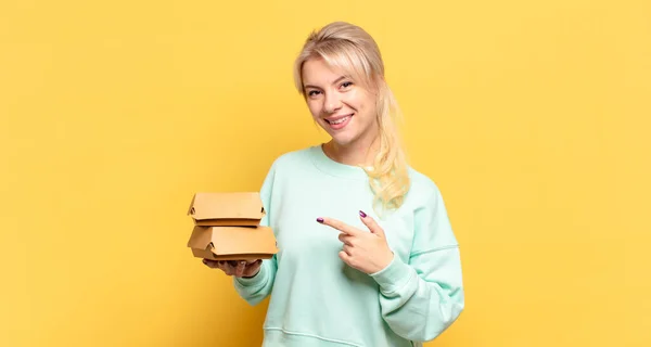 Blonde Woman Smiling Cheerfully Feeling Happy Pointing Side Upwards Showing — Stock Photo, Image