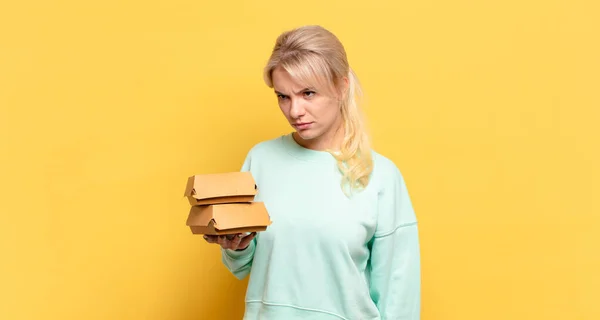 Blonde Woman Feeling Sad Upset Angry Looking Side Negative Attitude — Stock Photo, Image
