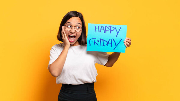 young pretty woman. happy friday concept