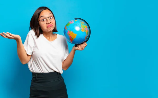 young pretty woman with a world globe map