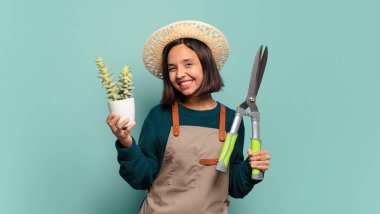 Kaktüslü genç ve güzel bir kadın. çiftçi kavramı