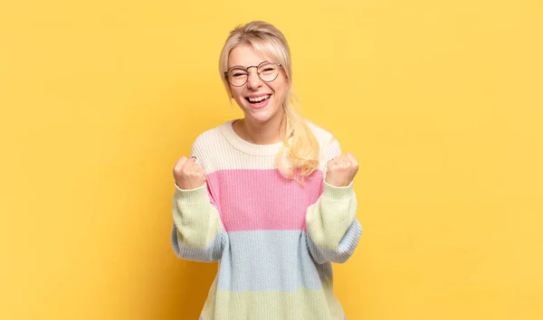 Blonde Woman Shouting Triumphantly Laughing Feeling Happy Excited While Celebrating — Stock Photo, Image