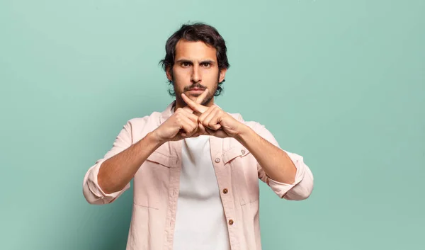 Young Handsome Indian Man Looking Serious Displeased Both Fingers Crossed — Stock Photo, Image