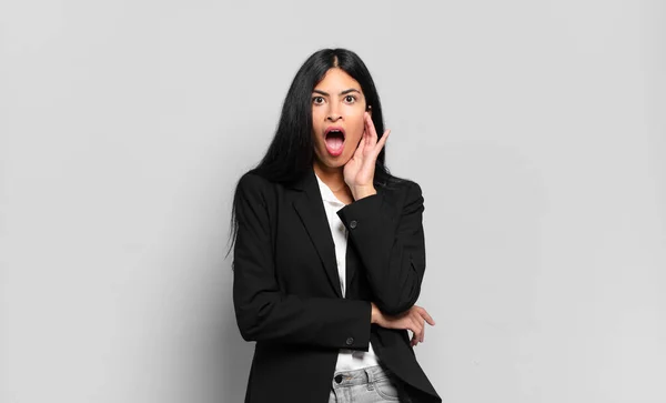 Young Hispanic Businesswoman Open Mouthed Shock Disbelief Hand Cheek Arm — Stock Photo, Image