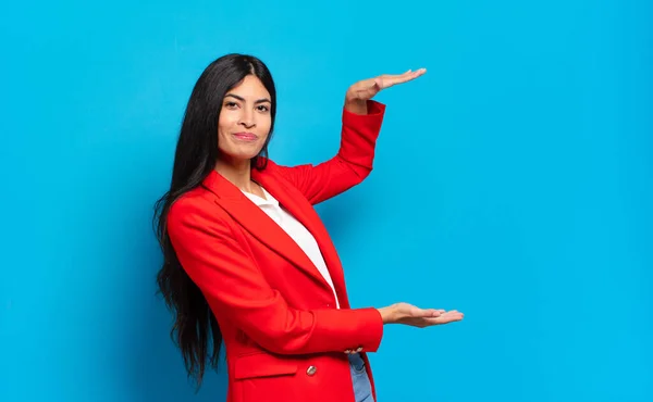 Young Hispanic Businesswoman Holding Object Both Hands Side Copy Space — Stock Photo, Image
