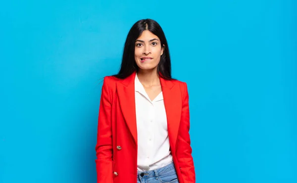 Young Hispanic Businesswoman Looking Puzzled Confused Biting Lip Nervous Gesture — Stock Photo, Image