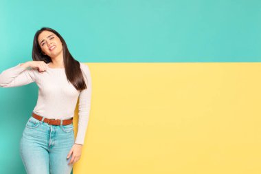 young pretty woman feeling stressed, anxious, tired and frustrated, pulling shirt neck, looking frustrated with problem. copy space to place your concept