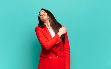 young pretty woman feeling tired, stressed, anxious, frustrated and depressed, suffering with back or neck pain. business concept