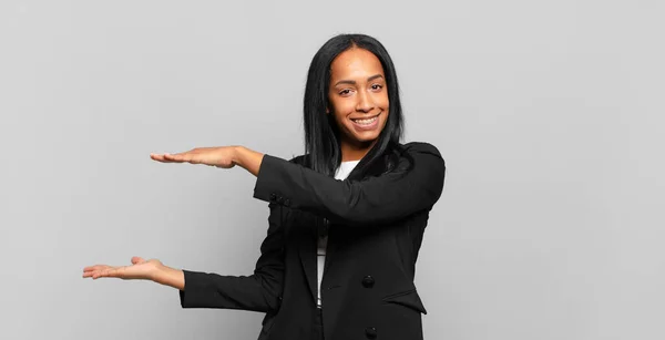 Young Black Woman Smiling Feeling Happy Positive Satisfied Holding Showing — Stockfoto