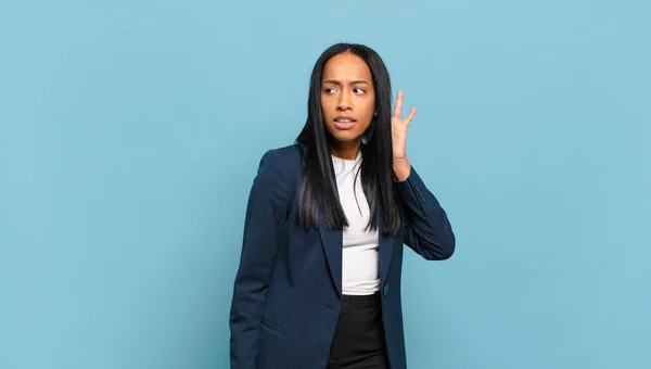 Young Black Woman Looking Serious Curious Listening Trying Hear Secret — Foto de Stock