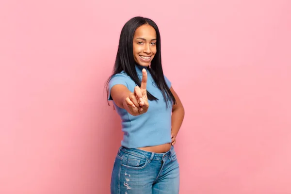 Young Black Woman Smiling Proudly Confidently Making Number One Pose — Foto de Stock
