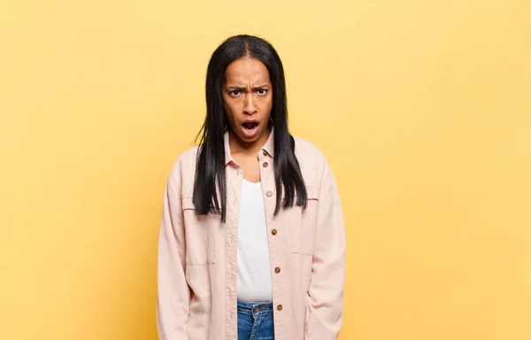Young Black Woman Looking Shocked Angry Annoyed Disappointed Open Mouthed —  Fotos de Stock