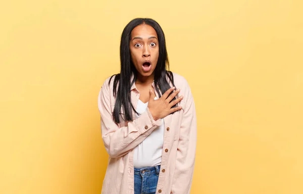 Young Black Woman Feeling Shocked Surprised Smiling Taking Hand Heart —  Fotos de Stock