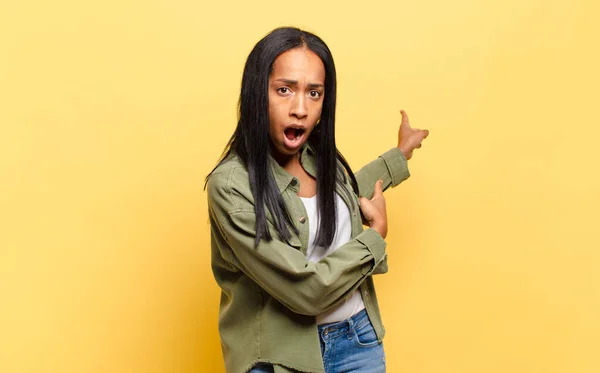 Young Black Woman Feeling Shocked Surprised Pointing Copy Space Side —  Fotos de Stock