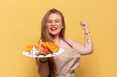 Genç ve güzel bir kadın gururlu bir fırıncı konsepti