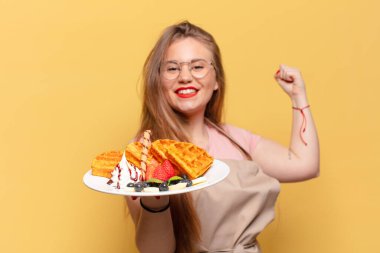 Genç ve güzel bir kadın gururlu bir fırıncı konsepti