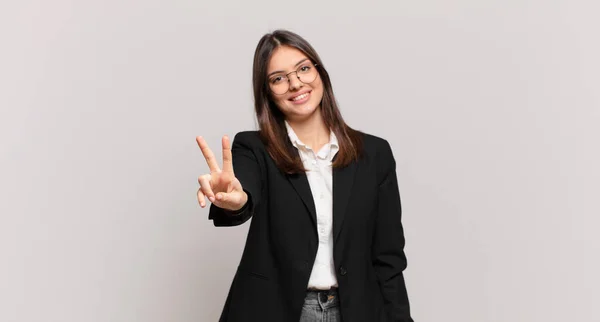 Young Business Woman Smiling Looking Happy Carefree Positive Gesturing Victory — Stock Photo, Image