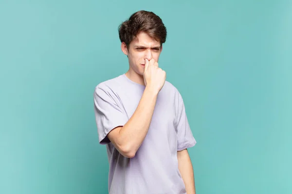 Young Boy Feeling Disgusted Holding Nose Avoid Smelling Foul Unpleasant — Stock Photo, Image