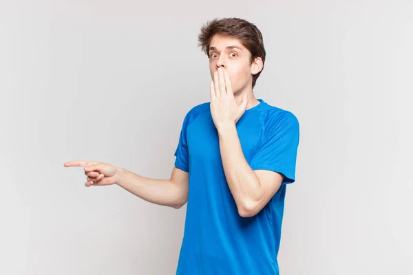 Young Boy Feeling Happy Shocked Surprised Covering Mouth Hand Pointing — Stock Photo, Image