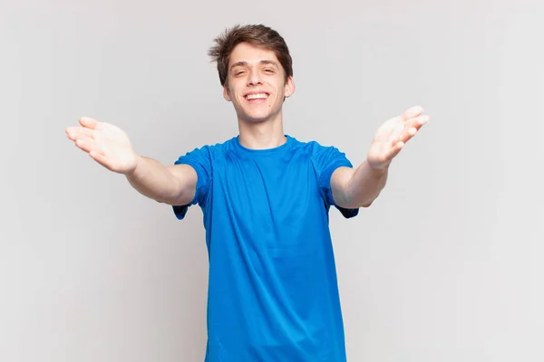 Young Boy Smiling Cheerfully Giving Warm Friendly Loving Welcome Hug — Stock Photo, Image