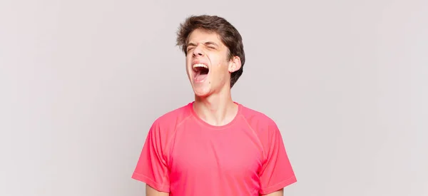 Young Boy Screaming Furiously Shouting Aggressively Looking Stressed Angry — Stock Photo, Image