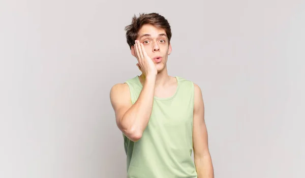 Young Boy Feeling Shocked Astonished Holding Face Hand Disbelief Mouth — Stock Photo, Image