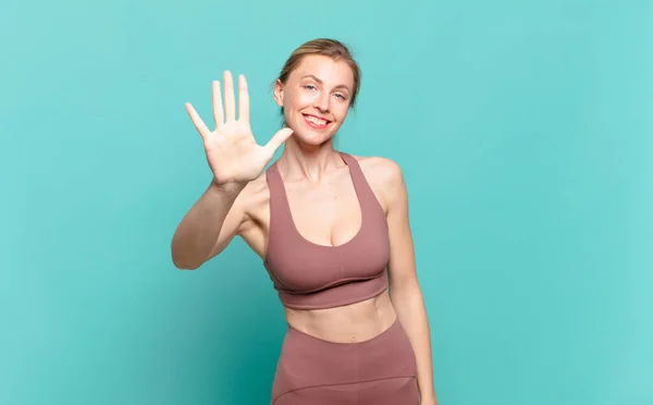 Young Blond Woman Smiling Looking Friendly Showing Number Five Fifth — Stock Photo, Image