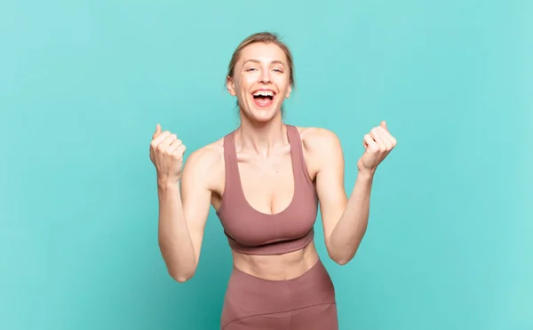 Young Blond Woman Shouting Triumphantly Laughing Feeling Happy Excited While — 图库照片
