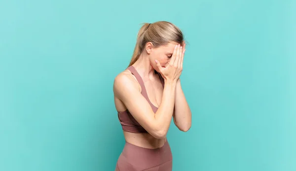 Young Blond Woman Covering Eyes Hands Sad Frustrated Look Despair — 图库照片