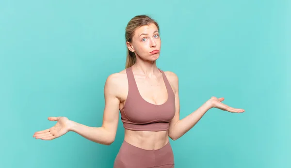 Young Blond Woman Feeling Puzzled Confused Unsure Correct Answer Decision — 스톡 사진