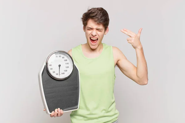 Young Boy Looking Unhappy Stressed Suicide Gesture Making Gun Sign — Stock Photo, Image