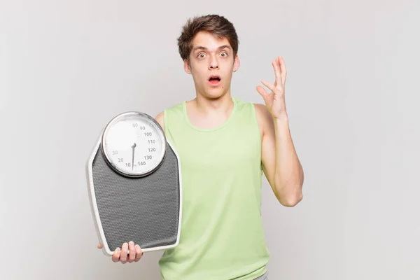 Young Boy Screaming Hands Air Feeling Furious Frustrated Stressed Upset — Stock Photo, Image