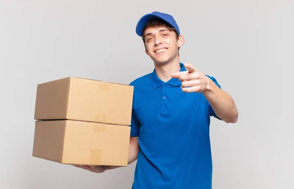 Young Package Deliver Boy Pointing Camera Satisfied Confident Friendly Smile — Stock Photo, Image