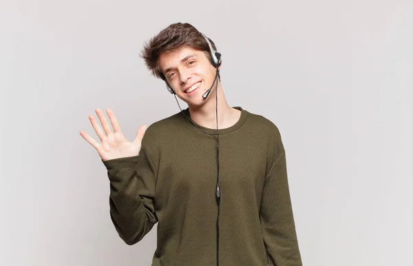 Young Telemarketer Smiling Looking Friendly Showing Number Five Fifth Hand — Stock Photo, Image