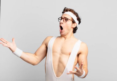 humorous sport man performing opera or singing at a concert or show, feeling romantic, artistic and passionate