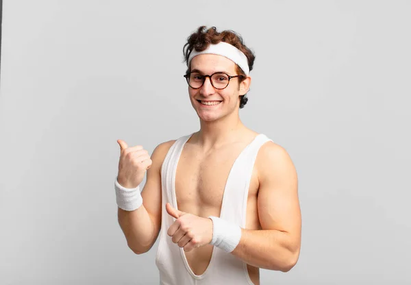 Humorous Sport Man Smiling Cheerfully Casually Pointing Copy Space Side — Stock Photo, Image