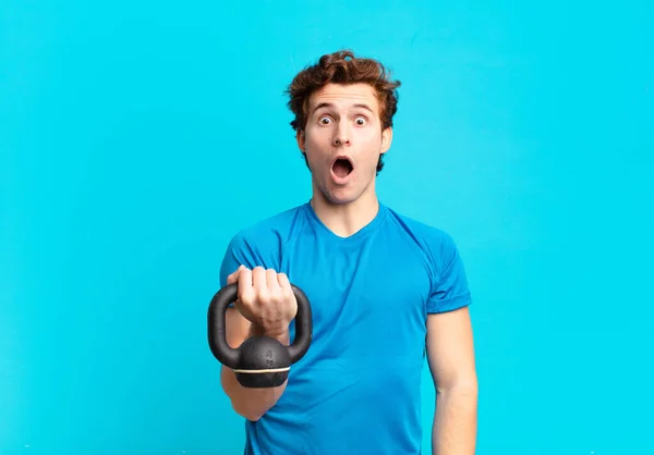 Young Sport Boy Looking Very Shocked Surprised Staring Open Mouth — Stock Photo, Image