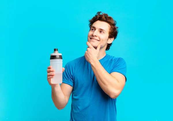 Sport Boy Smiling Happily Daydreaming Doubting Looking Side Energy Drink — Stockfoto
