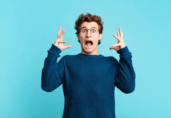 Young Handsome Boy Screaming Hands Air Feeling Furious Frustrated Stressed — Stock Photo, Image