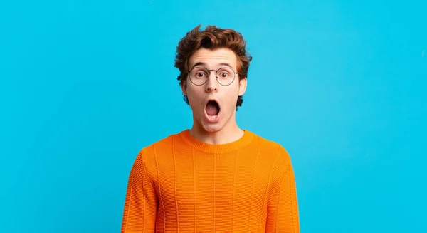 Young Handsome Boy Looking Very Shocked Surprised Staring Open Mouth — Stock Photo, Image