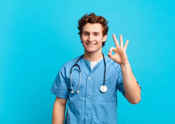 Jovem Enfermeiro Homem Sentindo Feliz Relaxado Satisfeito Mostrando Aprovação Com — Fotografia de Stock